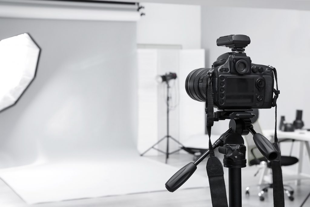 Cost of Professional Photographer - Photo studio with professional equipment and camera