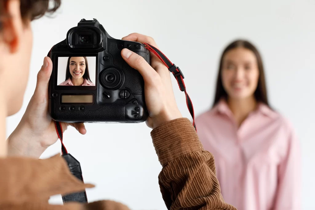 Woman being photographed for a portrait session