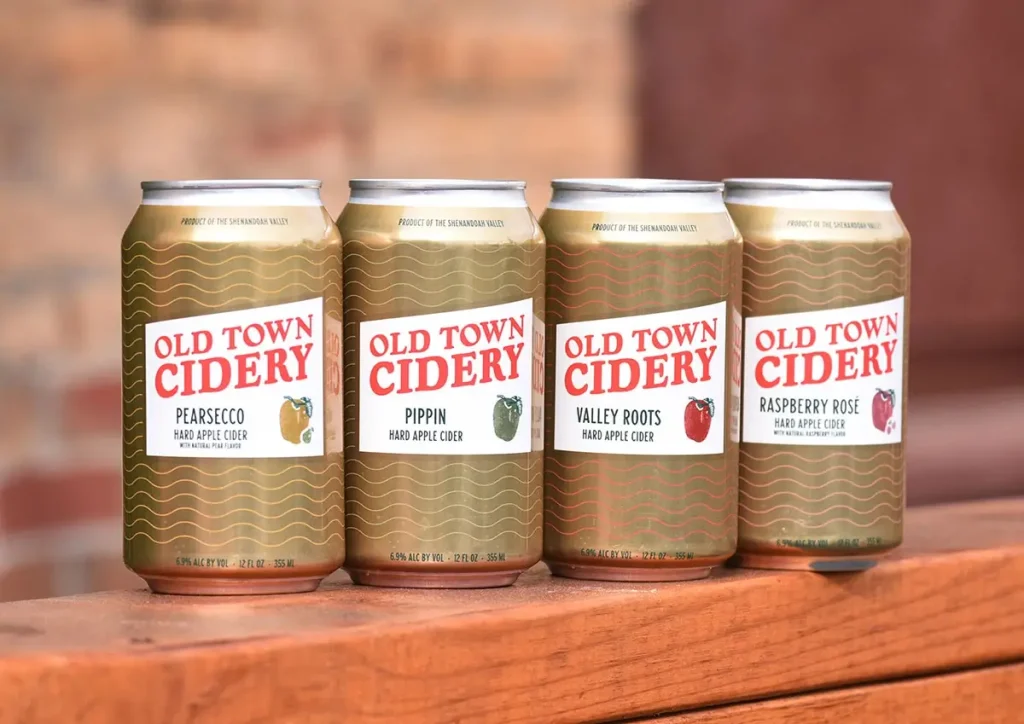 Cans of beverages produced by Old Town Cidery
